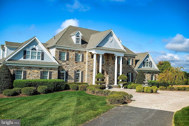 4116 Harford Creamery Rd, White Hall, MD 21161 - neoclassical home with driveway, stone siding, and a front lawn
