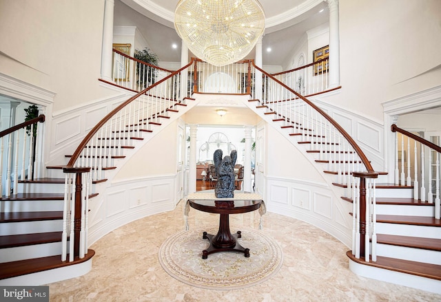 4116 Harford Creamery Rd, White Hall, MD 21161 - foyer with ornamental molding, a towering ceiling, a decorative wall, stairway, and a notable chandelier