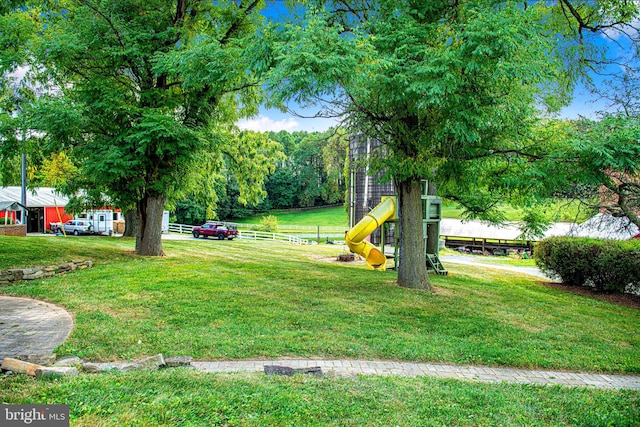 view of yard with a playground