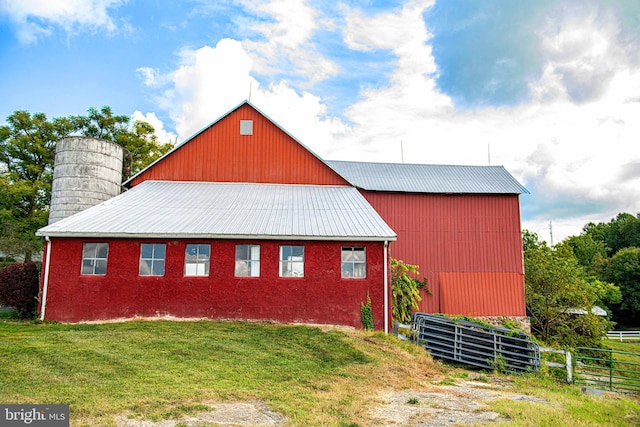 exterior space with a yard and an outdoor structure