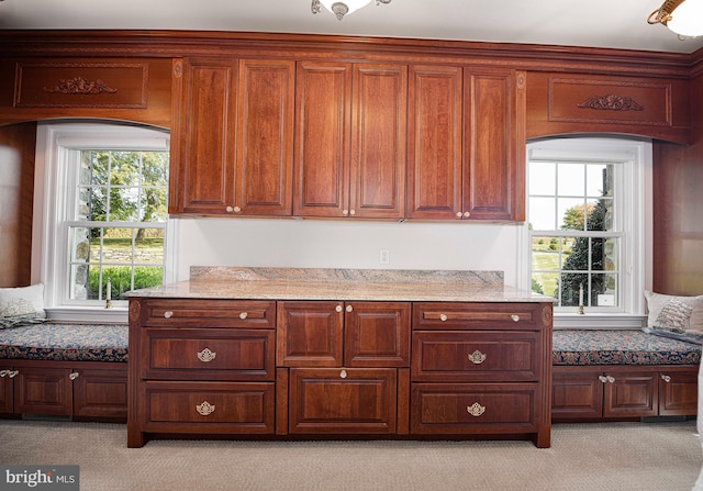4116 Harford Creamery Rd, White Hall, MD 21161 - kitchen with light stone counters, arched walkways, and light carpet