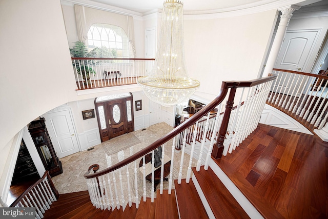 4116 Harford Creamery Rd, White Hall, MD 21161 - entrance foyer with crown molding, a chandelier, and wood finished floors