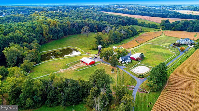 drone / aerial view with a rural view and a water view