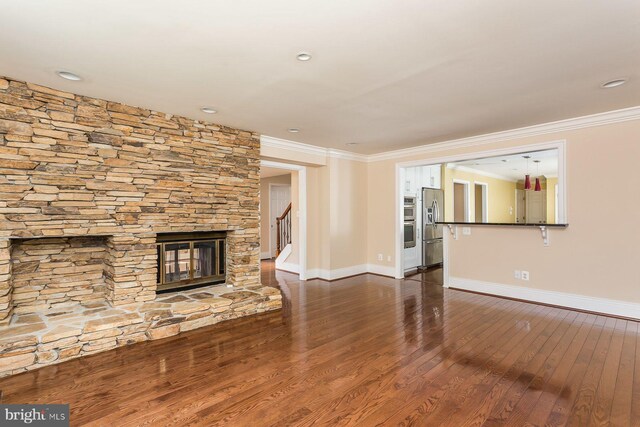 unfurnished bedroom with a closet, ceiling fan, and dark hardwood / wood-style floors