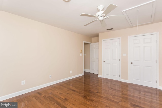 unfurnished bedroom with ceiling fan and wood-type flooring