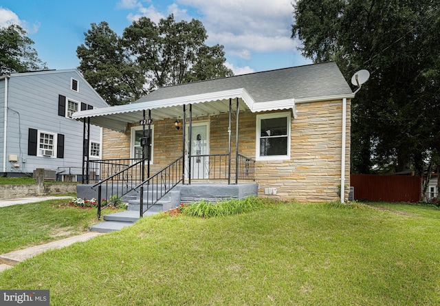 bungalow with a front lawn