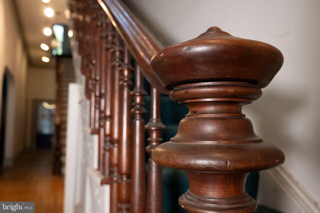 19 S Stricker St, Baltimore, MD 21223 - staircase with wood finished floors