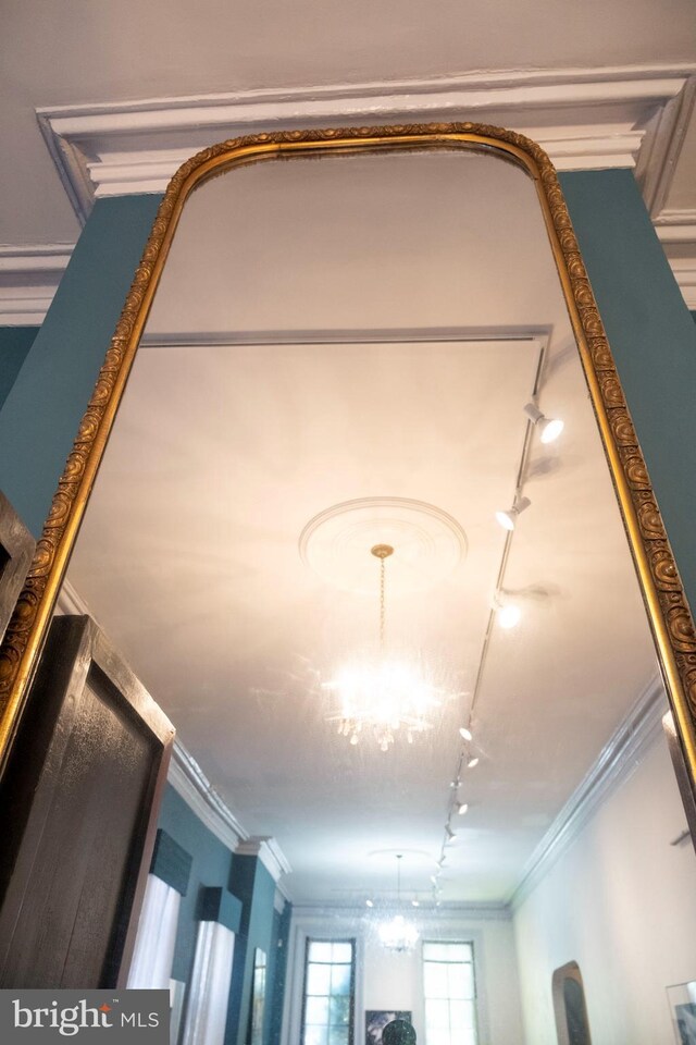 19 S Stricker St, Baltimore, MD 21223 - room details with crown molding and track lighting