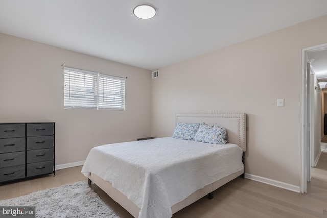 bedroom featuring light hardwood / wood-style floors