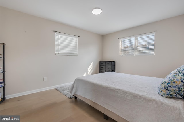 bedroom featuring hardwood / wood-style flooring