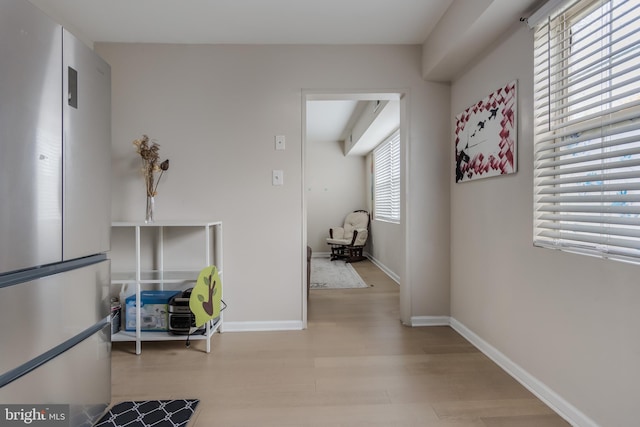 hallway featuring light hardwood / wood-style flooring