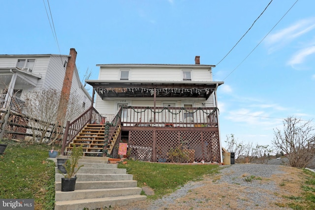 view of front of house featuring a deck