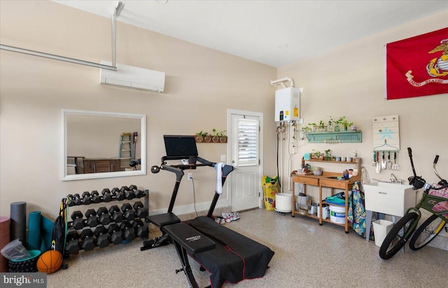 exercise room featuring water heater, an AC wall unit, and a garage