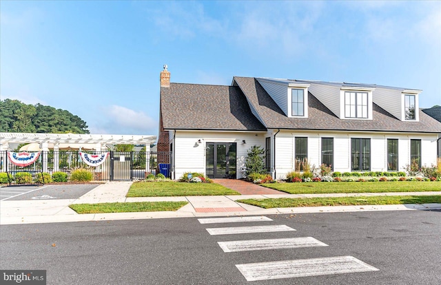 view of front of property with a front lawn