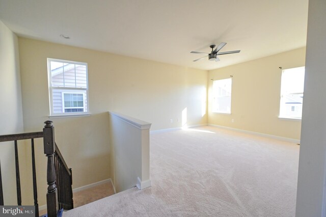 interior space featuring ceiling fan