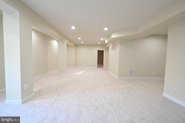 basement with light carpet