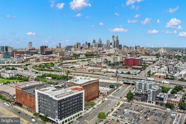 birds eye view of property featuring a city view