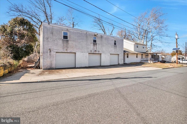 exterior space featuring a garage