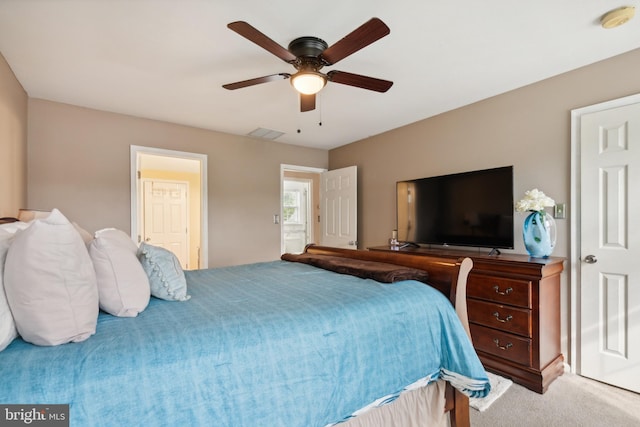 bedroom featuring light carpet and ceiling fan