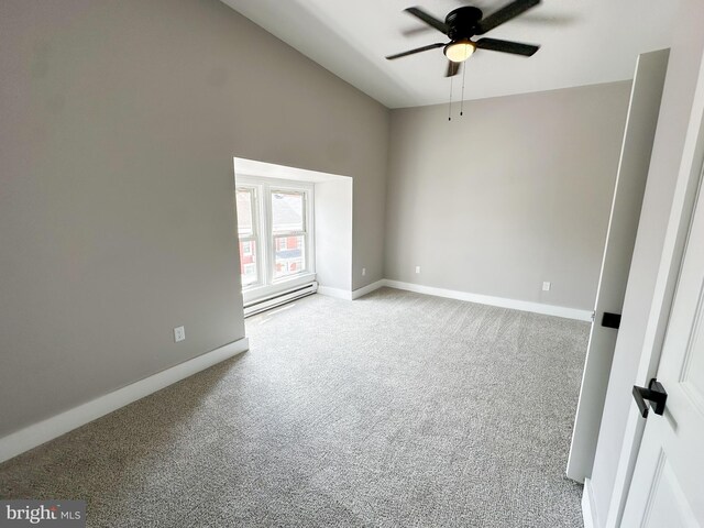 carpeted empty room with ceiling fan, high vaulted ceiling, and a baseboard radiator