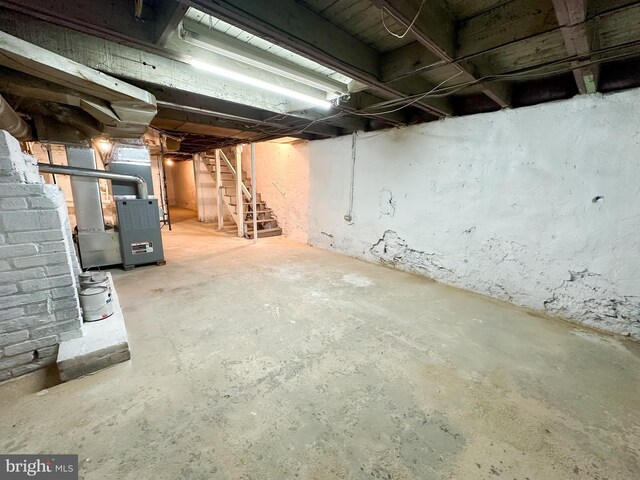 basement featuring heating unit