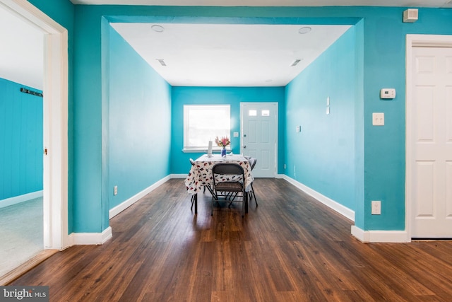 dining room featuring dark wood-type flooring