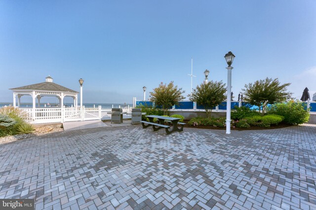 dock area featuring a water view