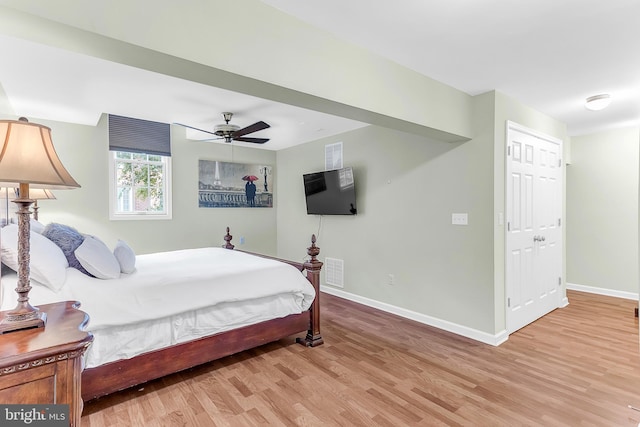 bedroom featuring ceiling fan and light wood-type flooring