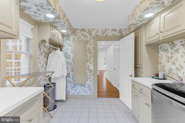 kitchen with sink and light hardwood / wood-style floors