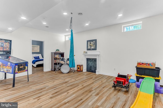 playroom with light wood-type flooring