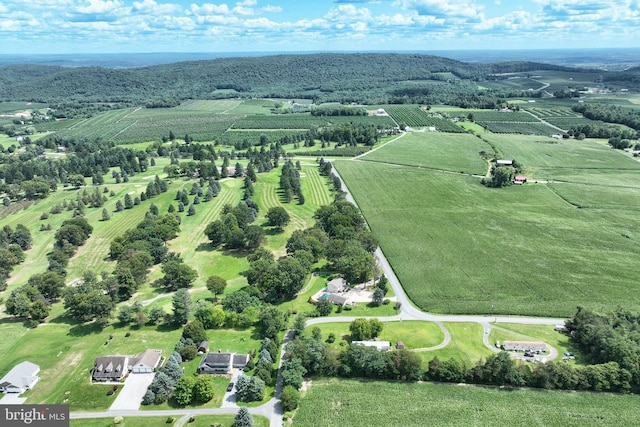 birds eye view of property featuring a rural view