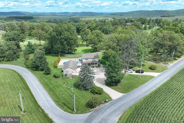 birds eye view of property featuring a rural view