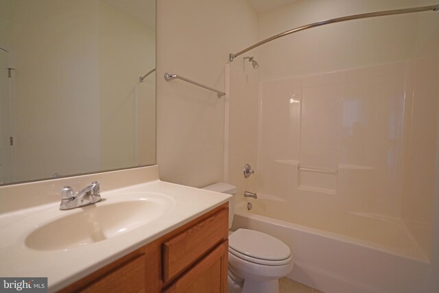 full bathroom with toilet, bathing tub / shower combination, and vanity