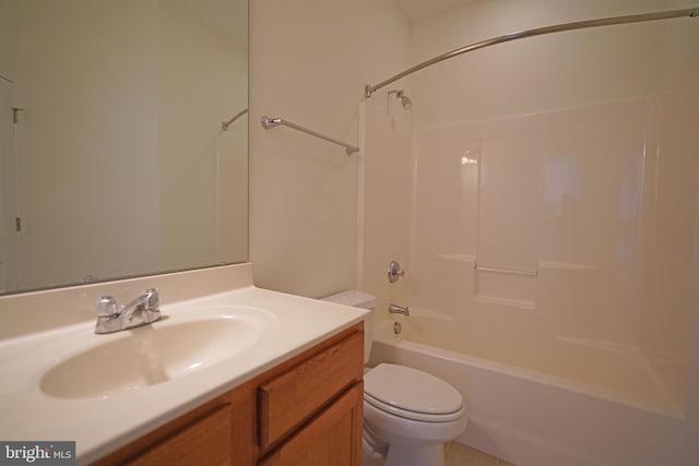 bathroom featuring shower / washtub combination, vanity, and toilet