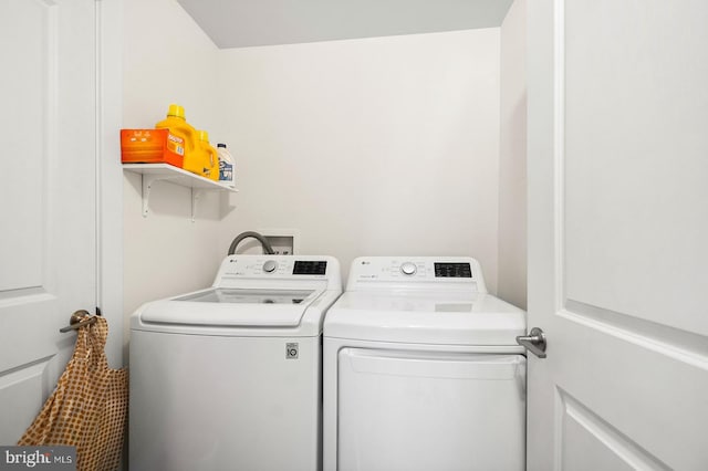 laundry room featuring independent washer and dryer