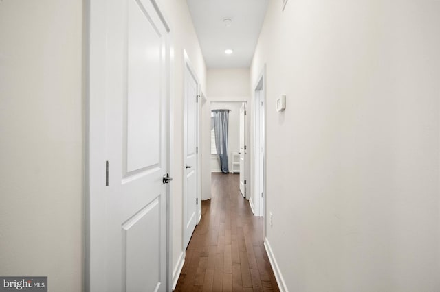 hall featuring dark hardwood / wood-style floors