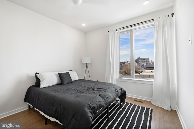 bedroom featuring hardwood / wood-style floors