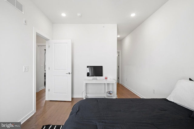 bedroom featuring wood-type flooring