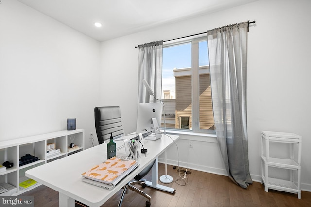 office area with hardwood / wood-style floors and plenty of natural light