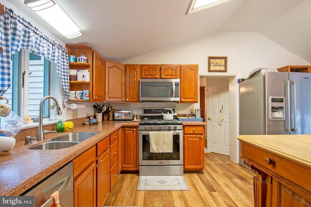 kitchen featuring open shelves, stainless steel appliances, lofted ceiling, light countertops, and a sink