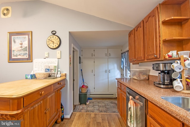 kitchen featuring light wood-type flooring, lofted ceiling, a baseboard radiator, and dishwasher