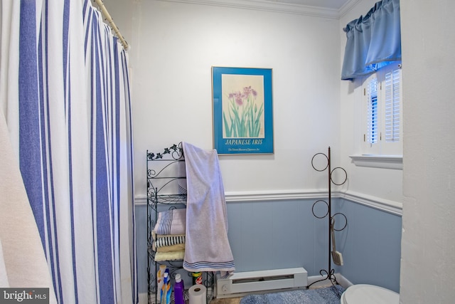 bathroom featuring toilet, a baseboard radiator, and ornamental molding