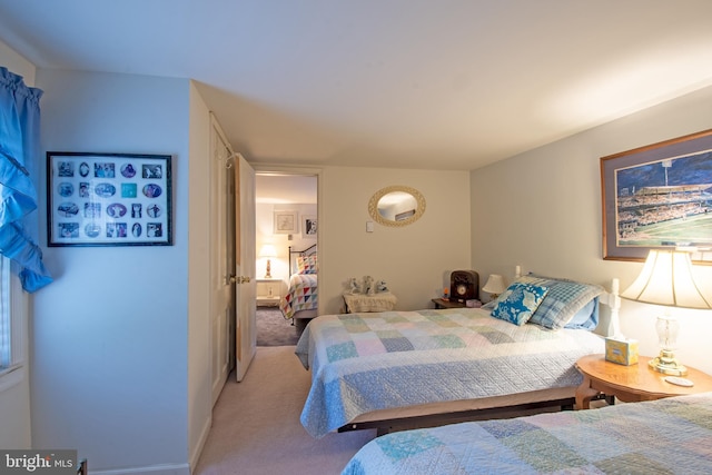 bedroom featuring carpet flooring