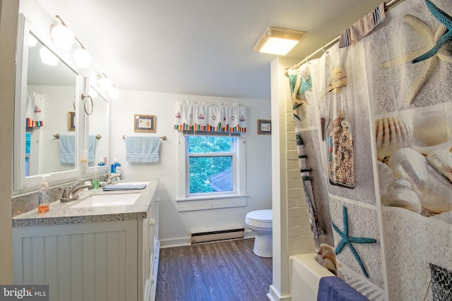 full bathroom featuring toilet, shower / bath combo with shower curtain, vanity, hardwood / wood-style flooring, and a baseboard heating unit