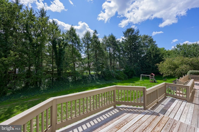 wooden deck with a yard