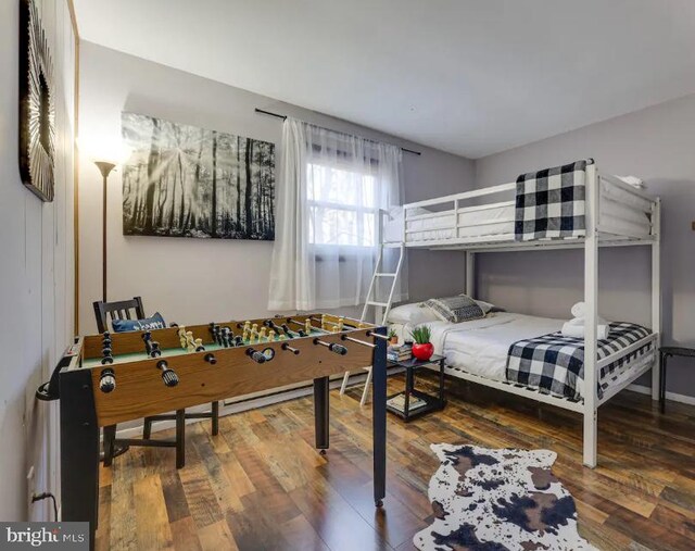 bedroom with wood-type flooring