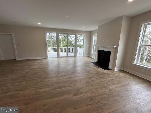 unfurnished living room featuring light hardwood / wood-style flooring