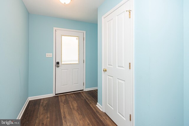 doorway featuring dark hardwood / wood-style flooring