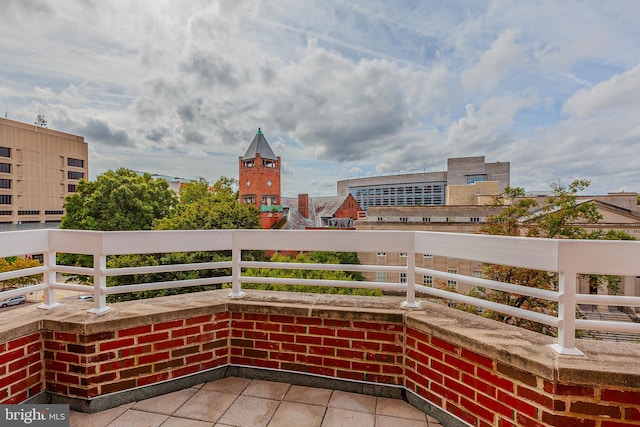 view of patio with a balcony