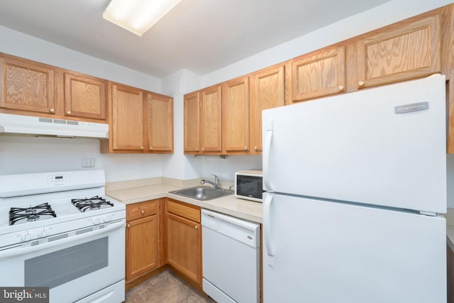 kitchen with white appliances and sink